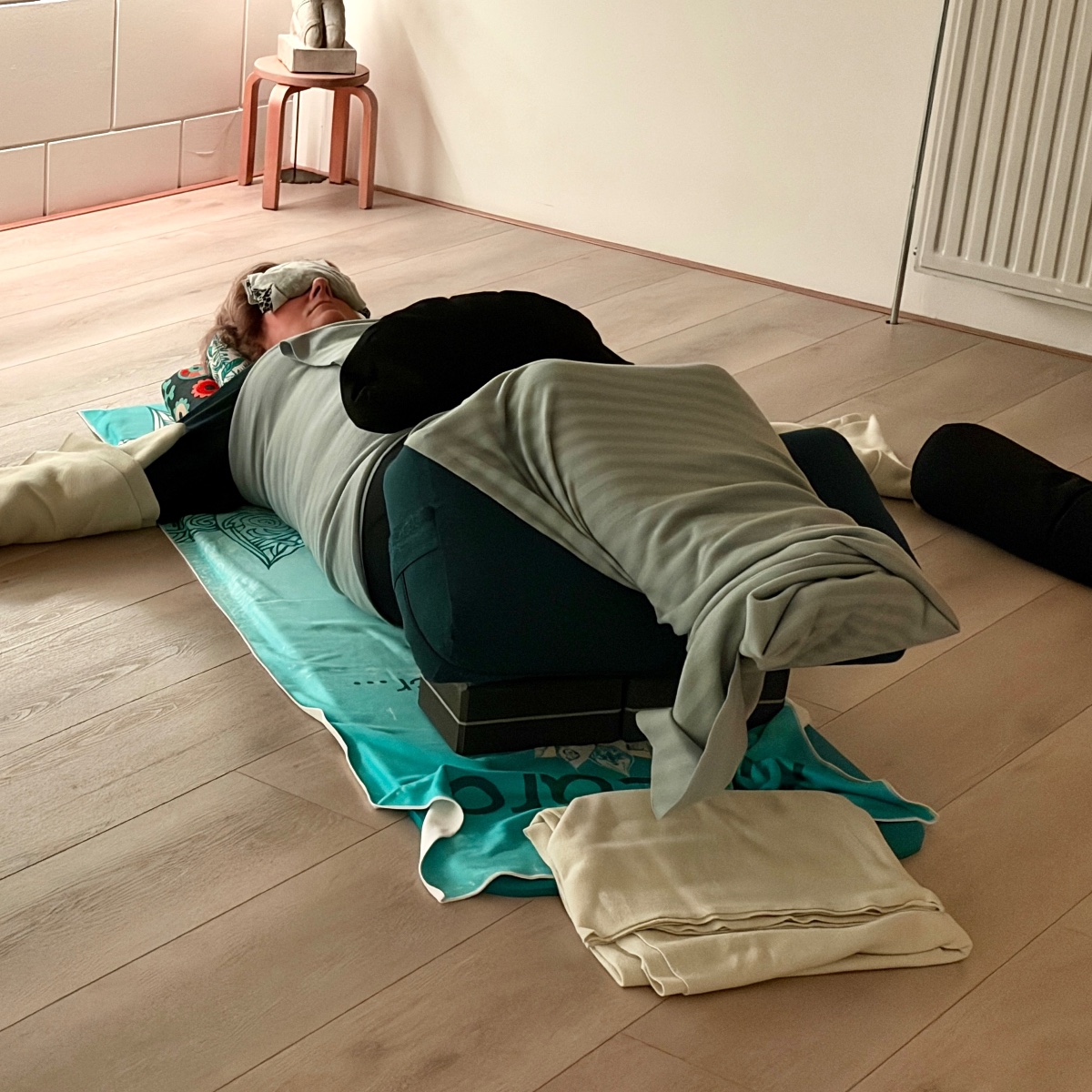 Restorative Yoga supported with pillows and blankets